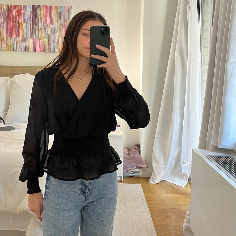Black long sleeve cami. Size small peplum bottom. Sinched waist. Great condition